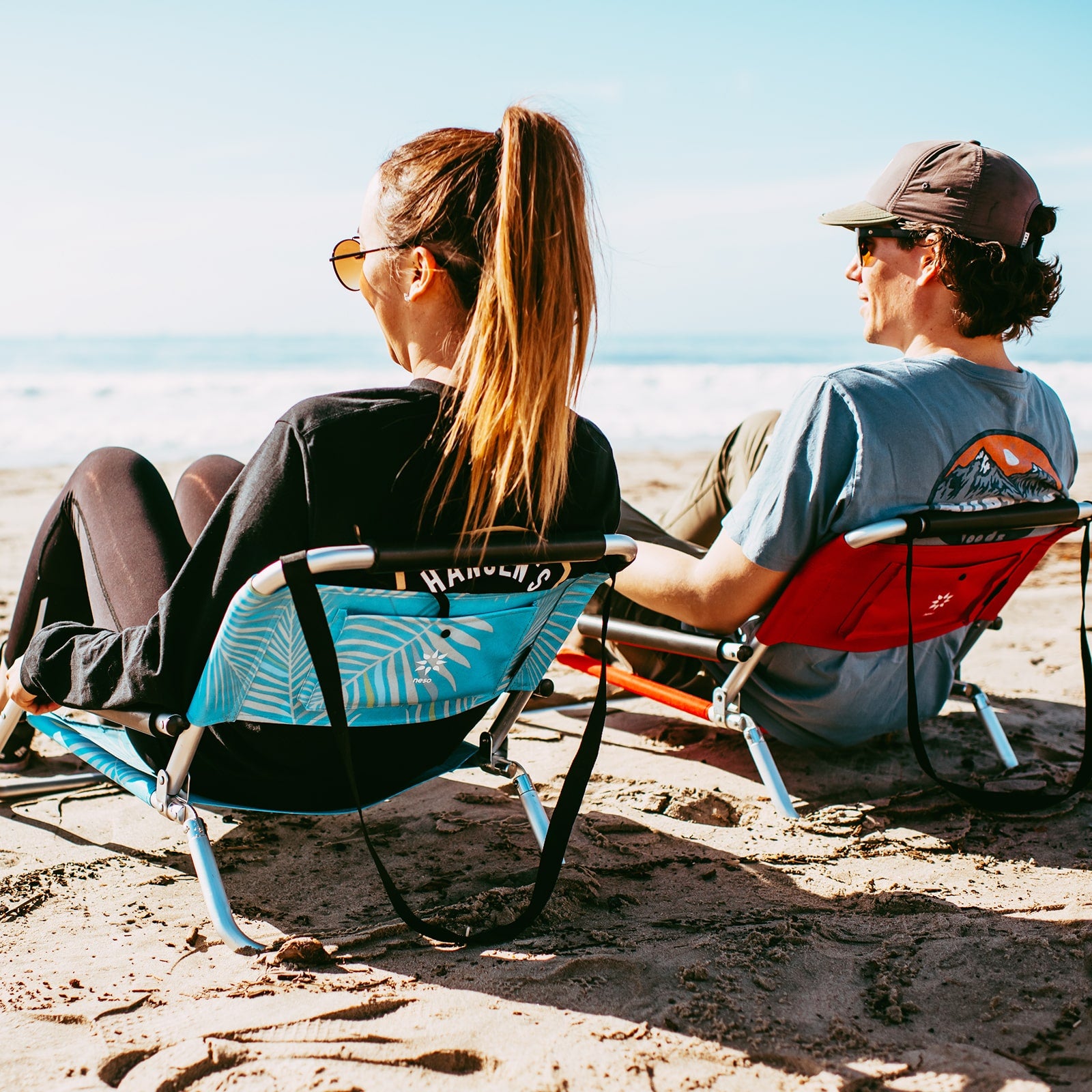 Sitting on beach online chair